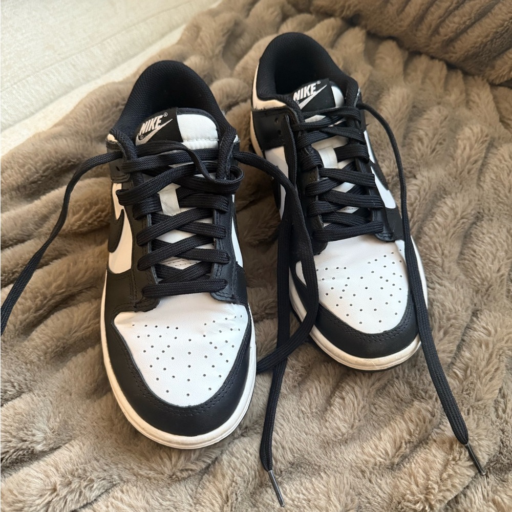 Nike Women’s Low Dunks Black and White Low-Top Sneakers